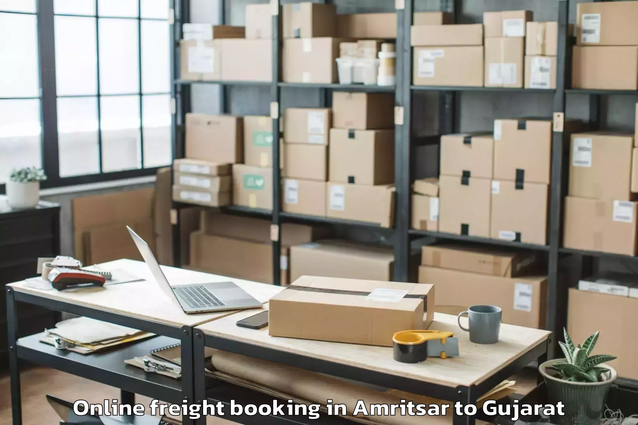 Top Amritsar to Karjan Online Freight Booking Available